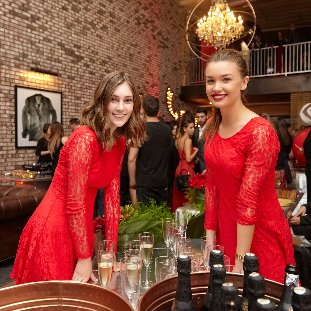female-cocktail-server-in-red-dress