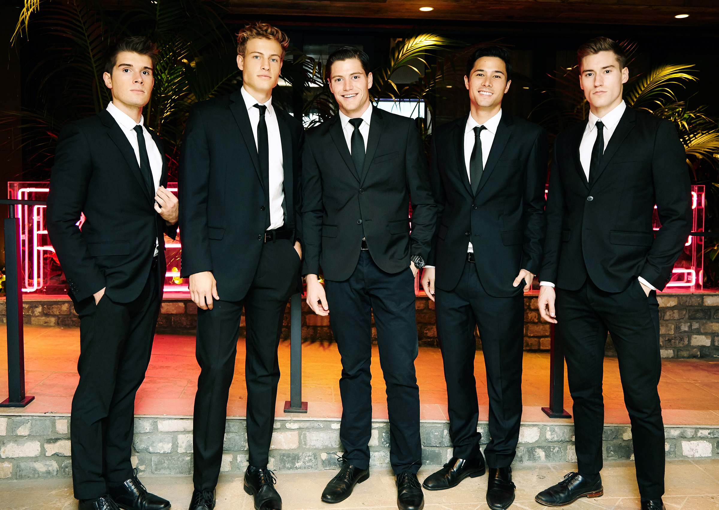 group-of-male-models-in-balck-suit