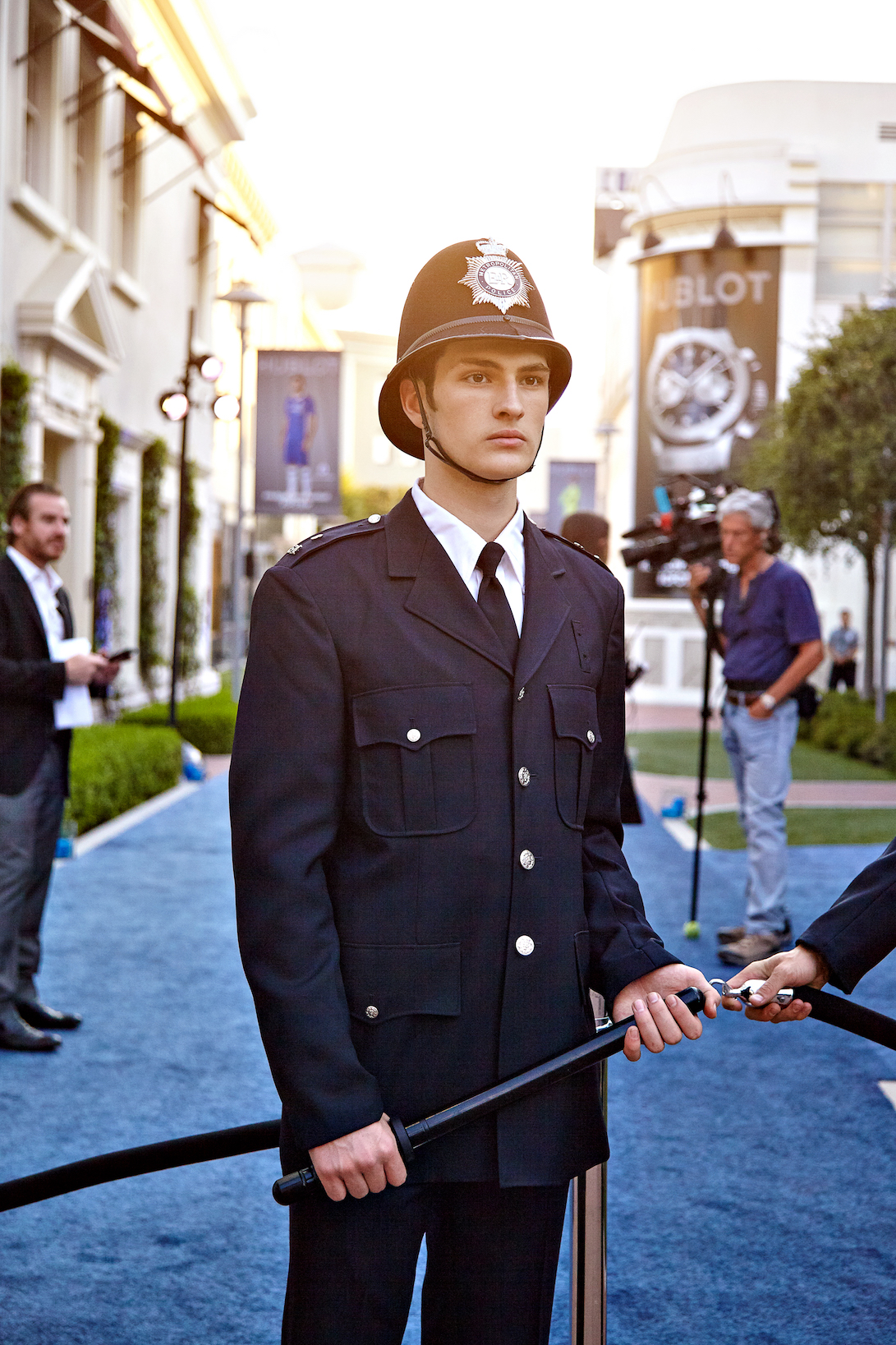 a person in a uniform holding a sword